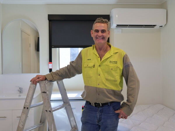 CBC tradesperson upgrading camp rooms